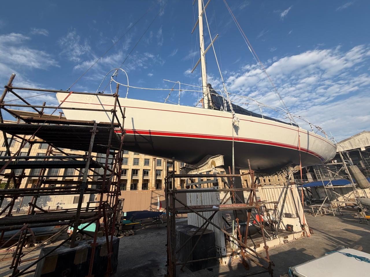 Hull with fresh paint and red cove stripes