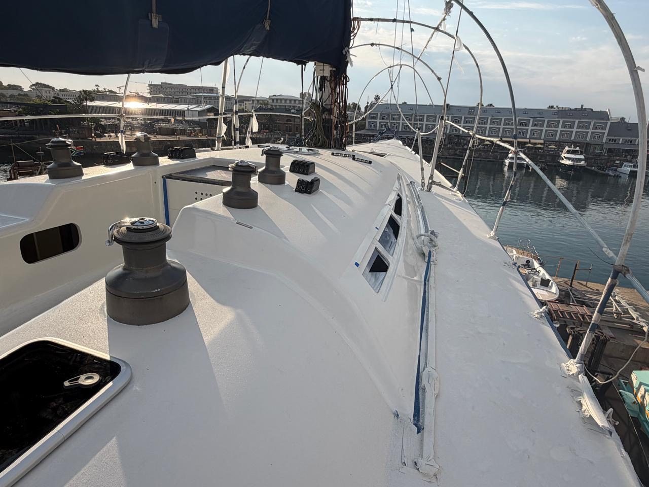 Freshly painted deck and winches in evening light